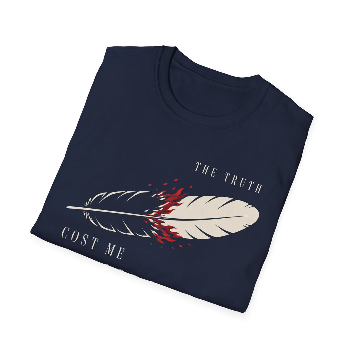 A navy blue folded t-shirt with a graphic print of a feather, red splatters, and the text 'THE TRUTH COST ME' on a white background.